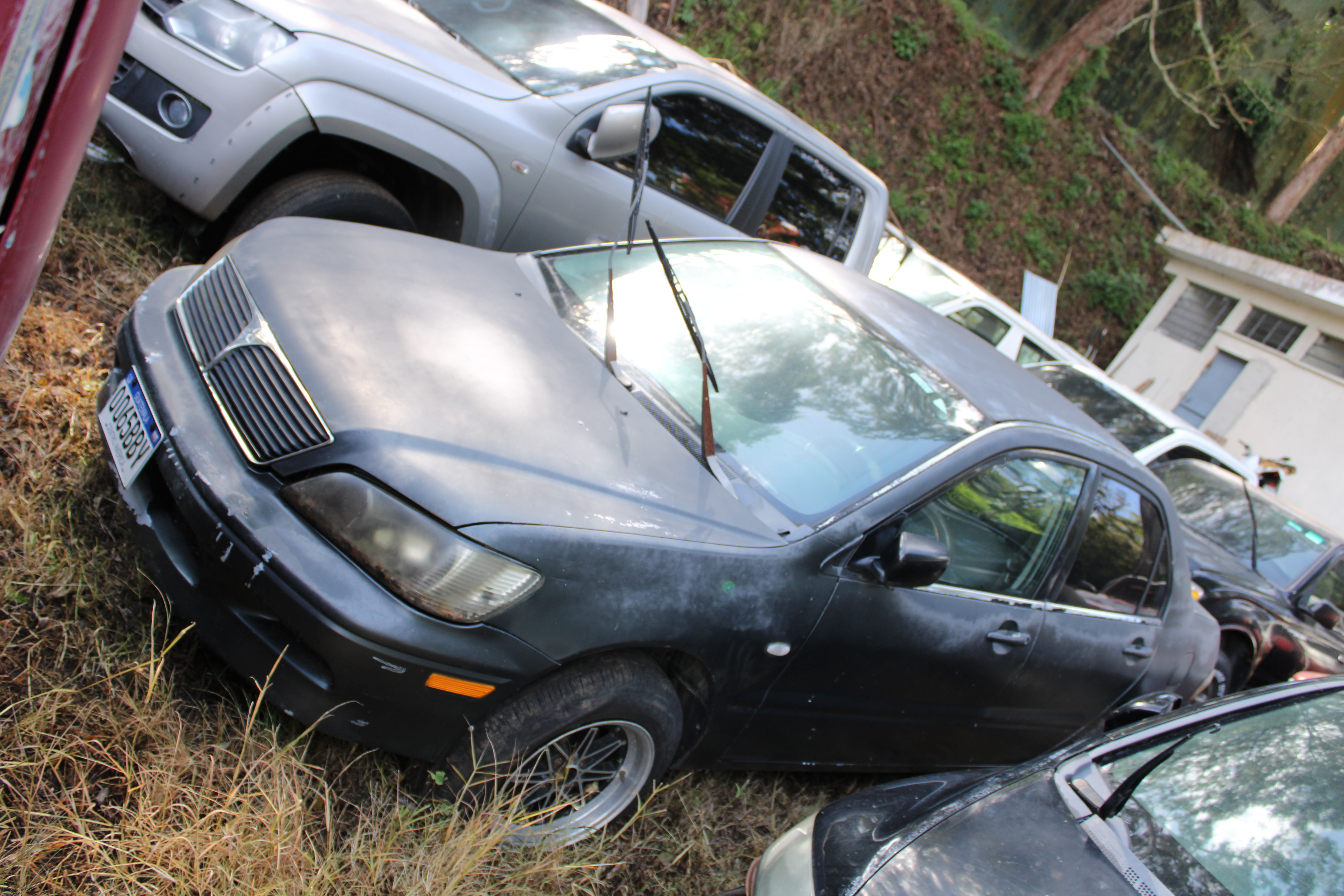 Automóvil Mitsubishi Lancer ES 2002 (lote 16)