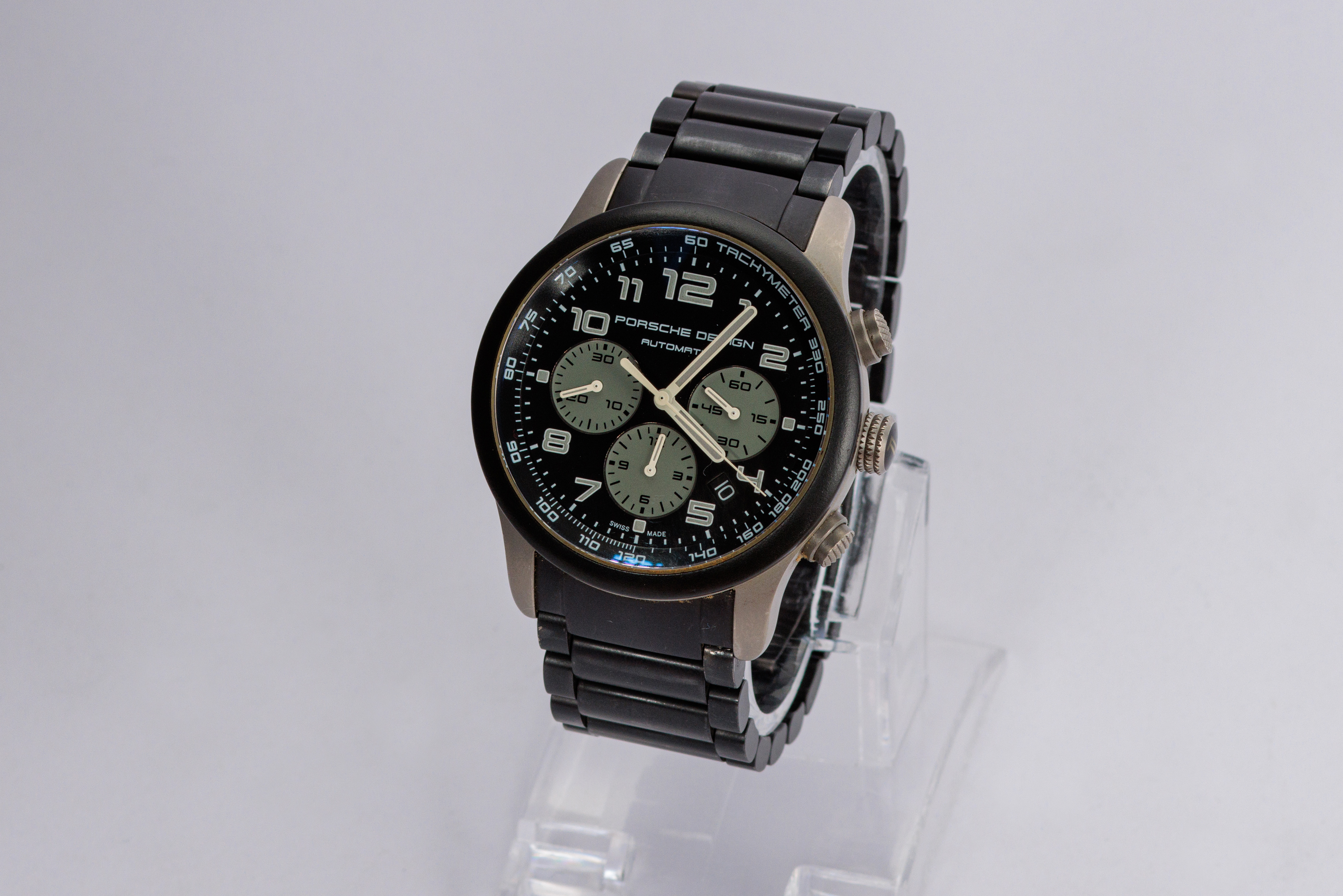 RELOJ: Marca Porsche Desing, titanium con baño iónico negro, caja de 42mm, corazón… (lote 11)