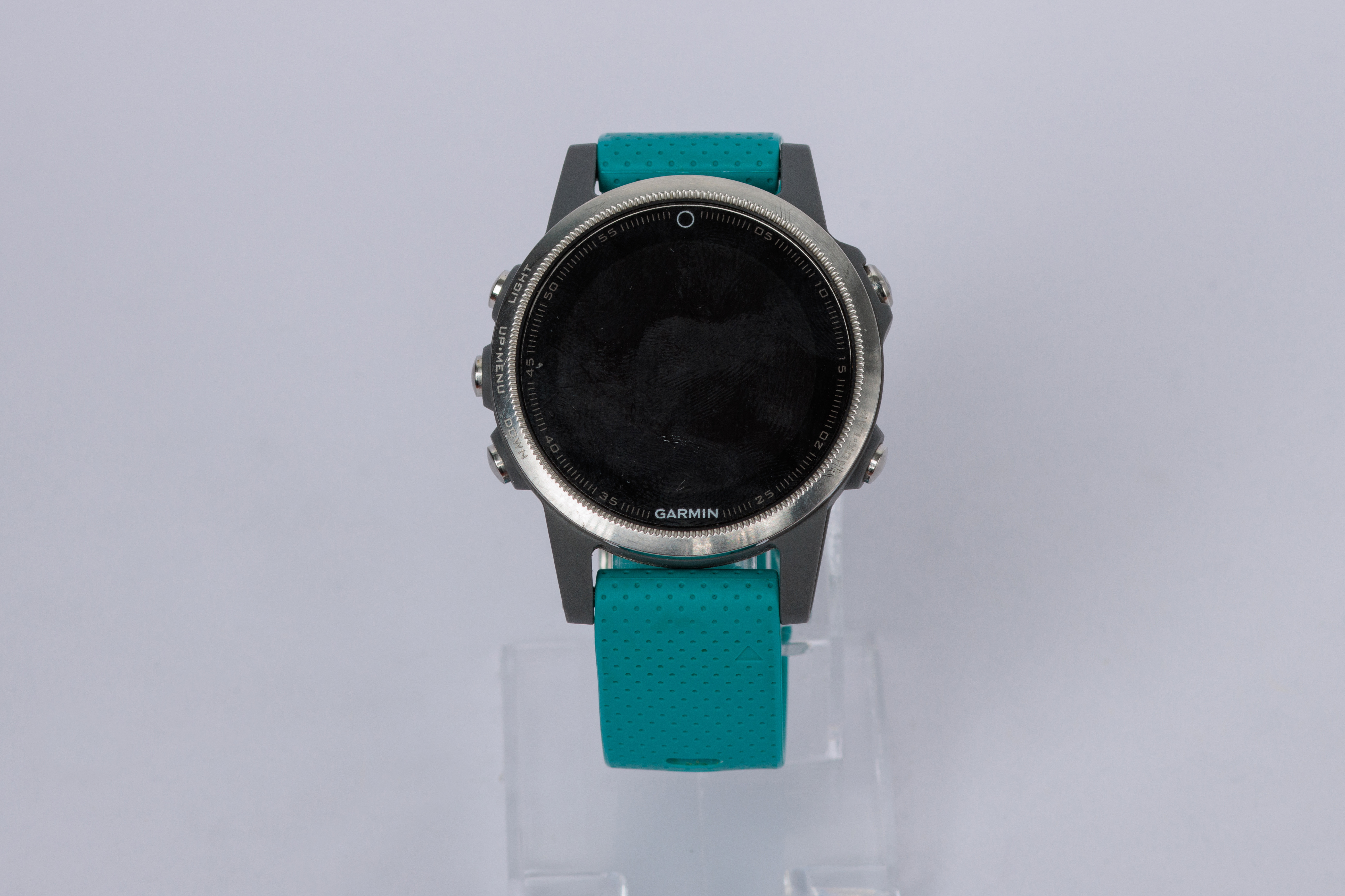 RELOJ: Marca Garmin, caja plateada, banda turquesa, sin cargador, se desconoce su… (lote 14)