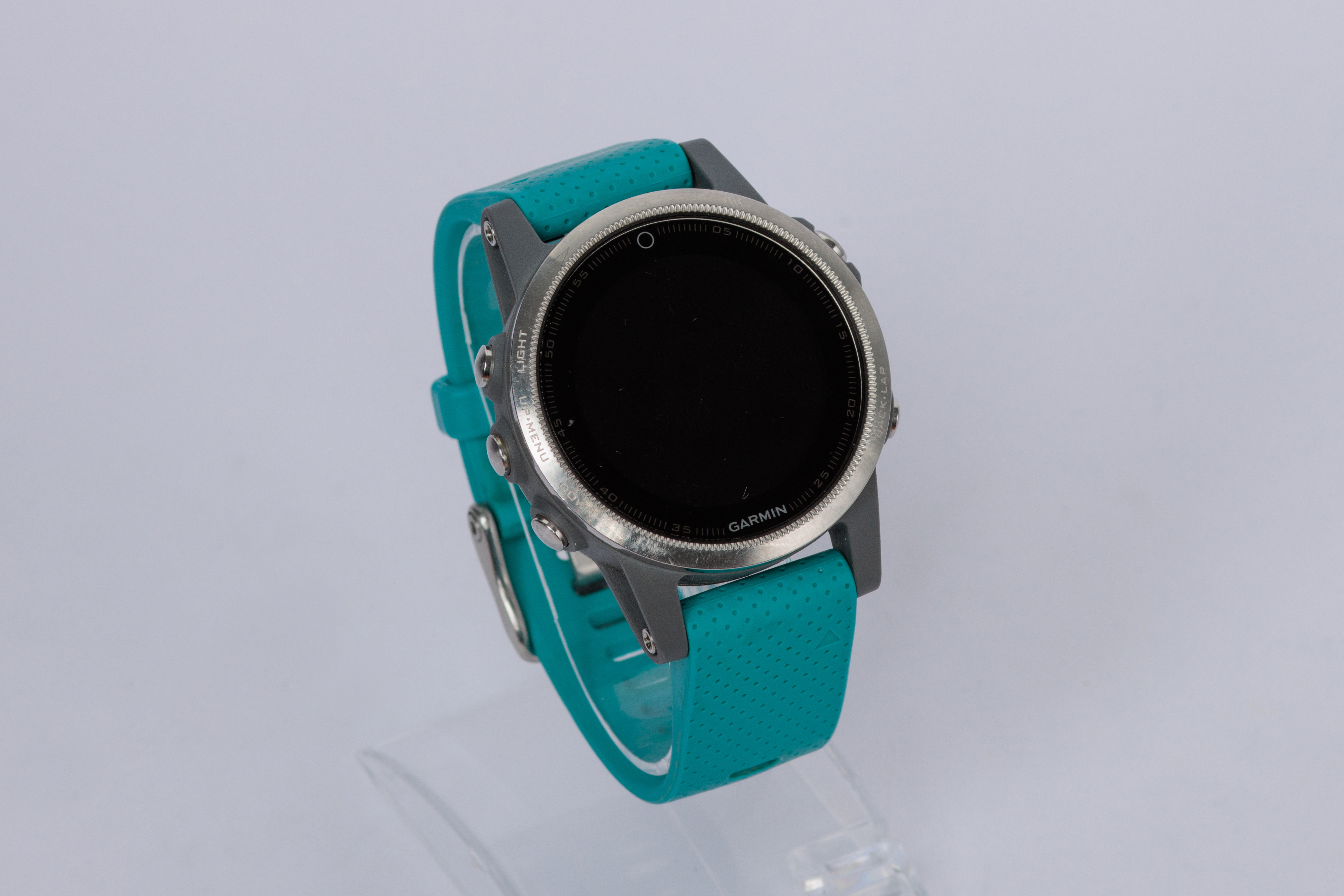 RELOJ: Marca Garmin, caja plateada, banda turquesa, sin cargador, se desconoce su… (lote 14), fotografía 2